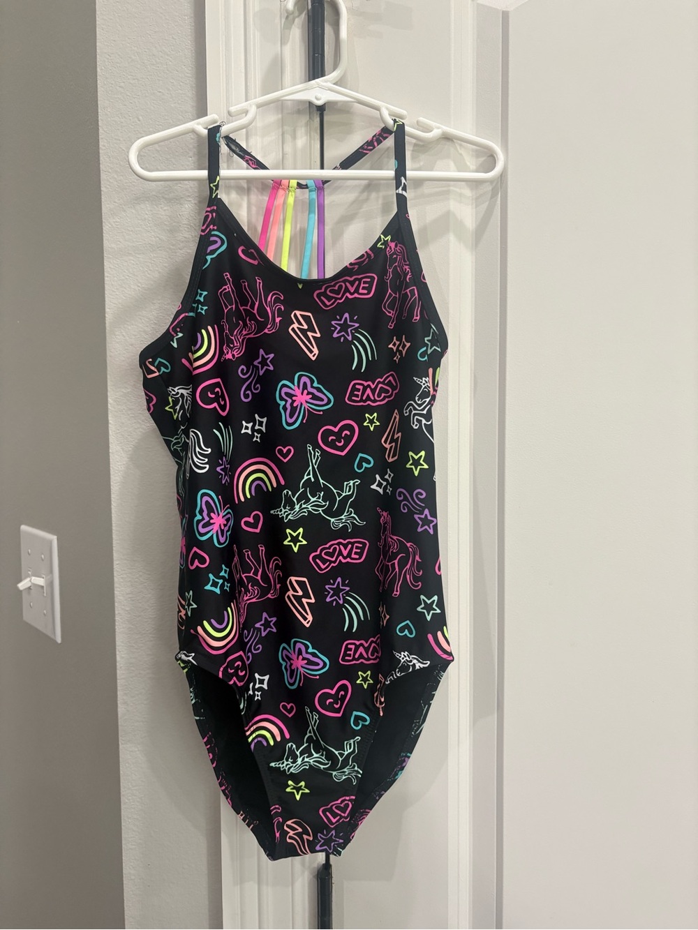 Children’s Place black with unicorns & rainbows one piece swimsuit Medium 7/8